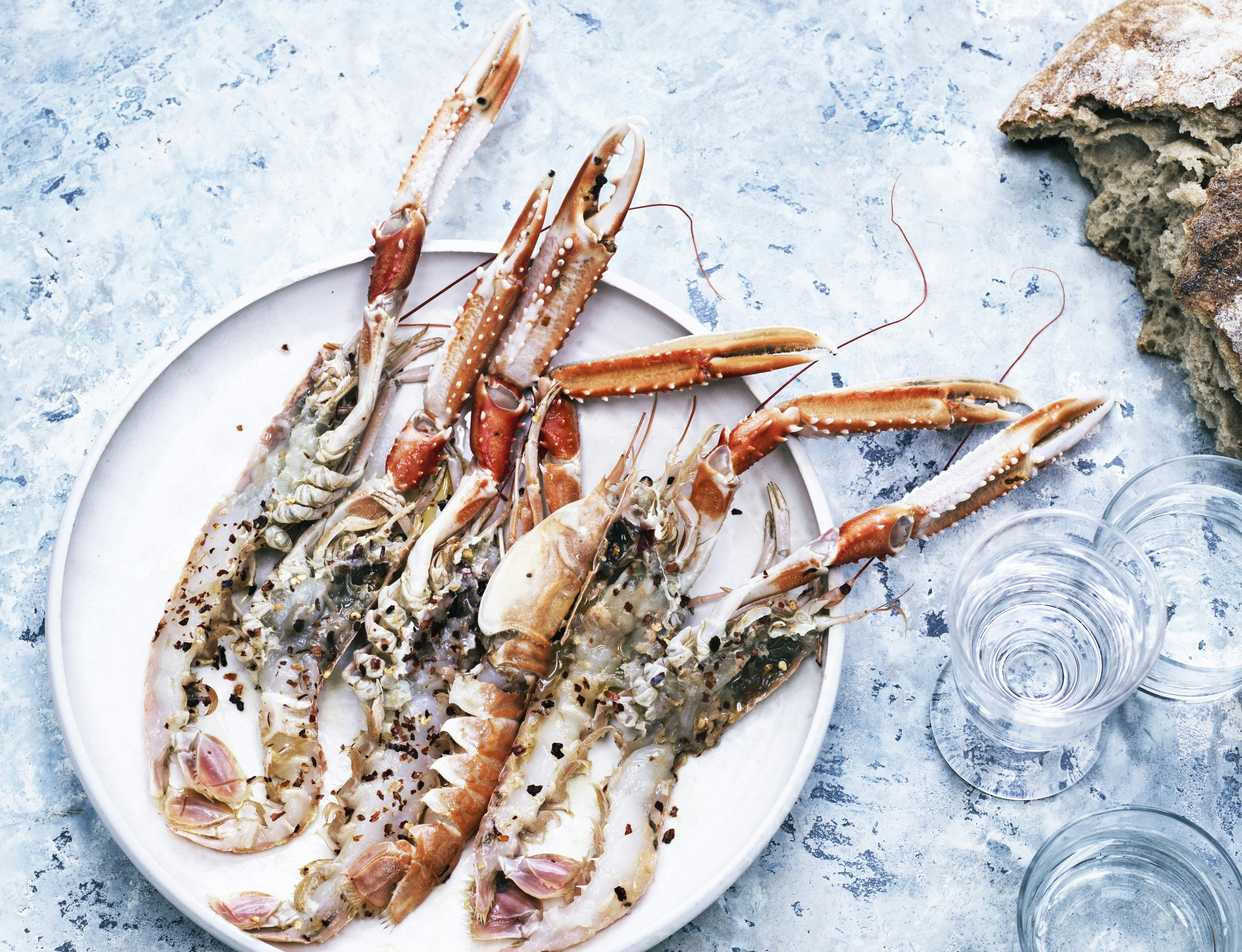 Rå jomfruhummer i olie og chili